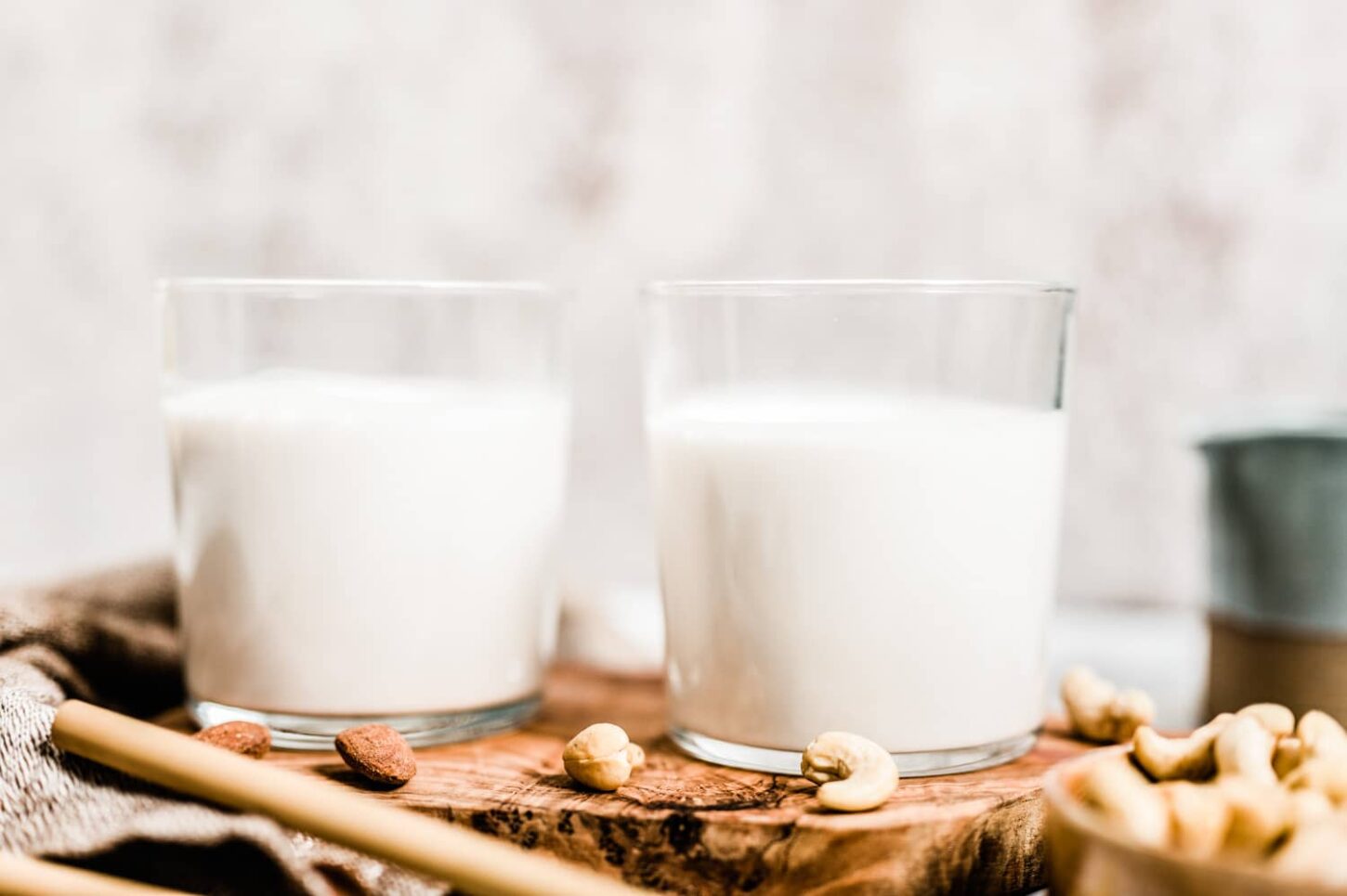 Homemade Almond Milk in Glasses Made With Raw Almonds and Cashews