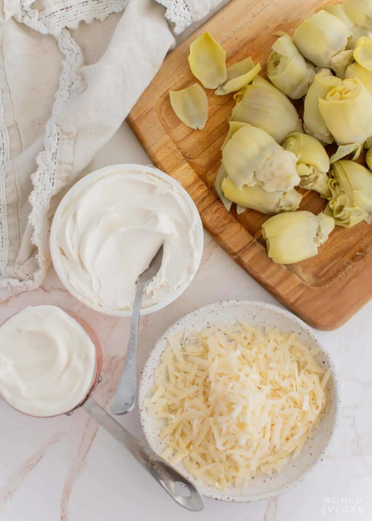 vegan artichoke dip ingredients parmesan dairy free cream cheese mayo and artichokes