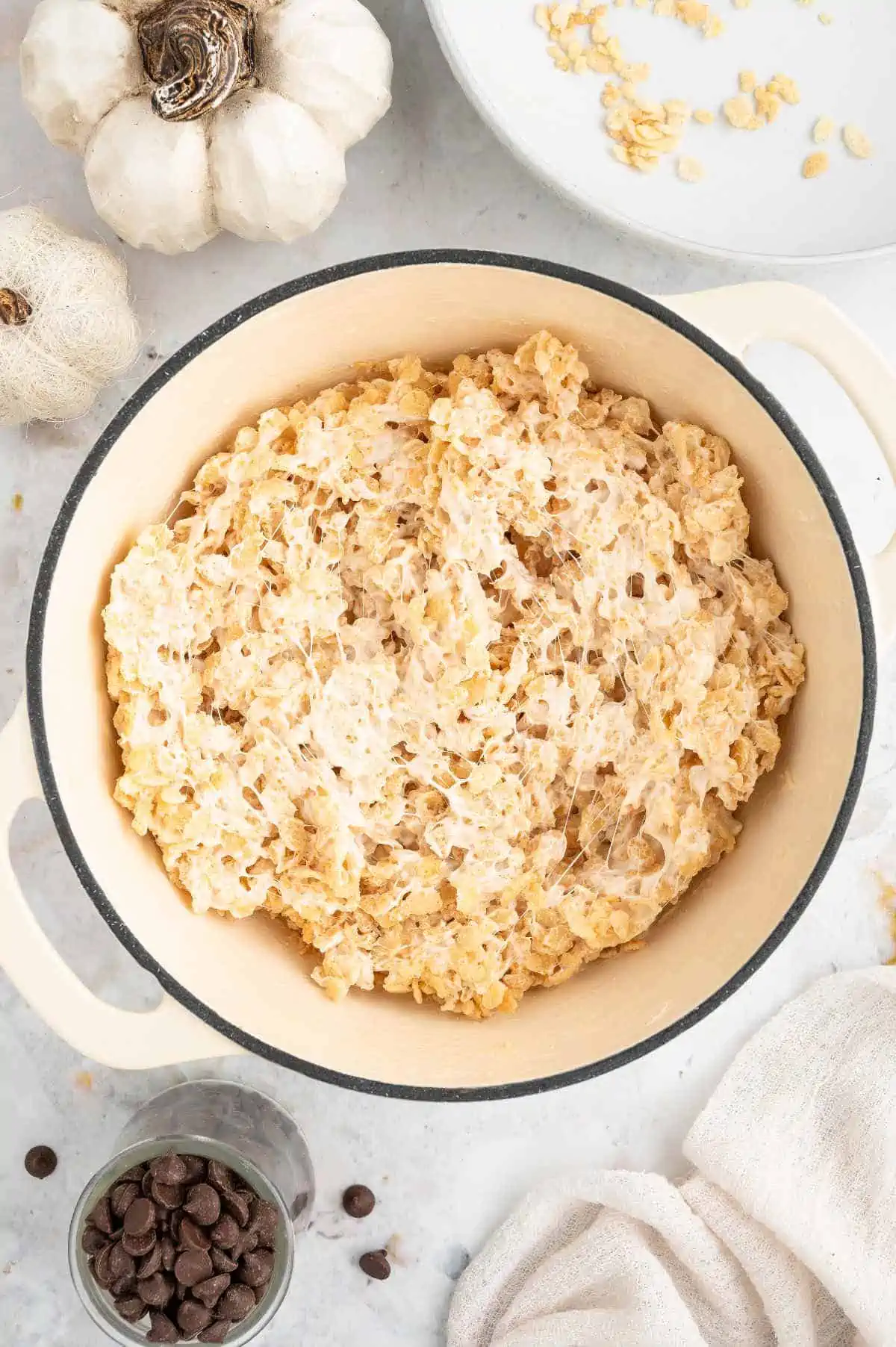 Puffed rice cereal mixed in to the melted mixture.