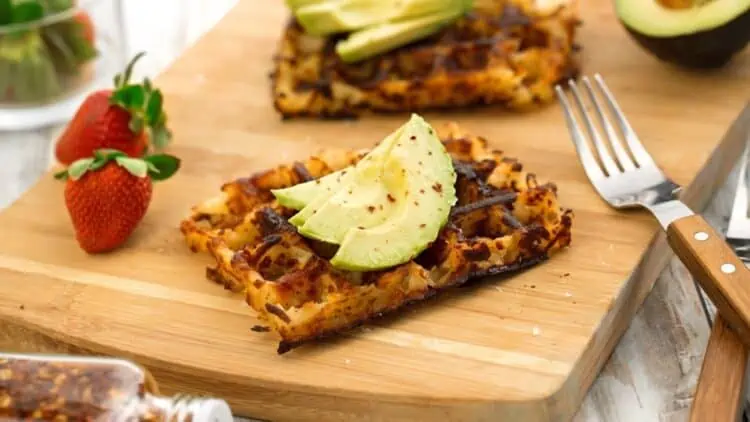 vegan gluten free recipe for hash browns made with waffle iron and topped with avocado