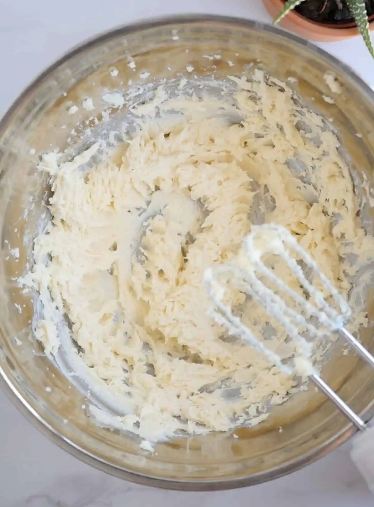 Vegan butter and sugar beaten together with an electric hand mixer.