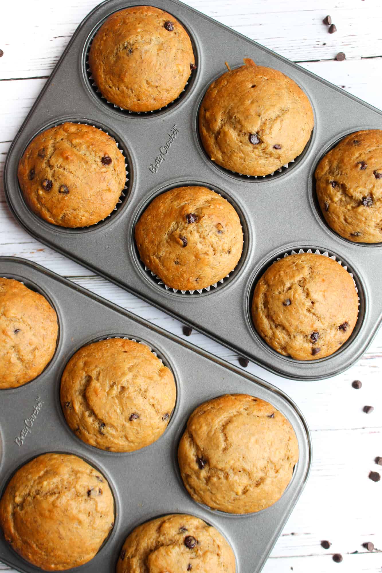 Vegan Chocolate Chip Banana Muffins in muffin pans.