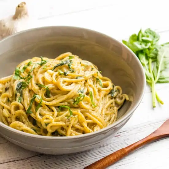 One Pot Pasta in a creamy sauce in a bowl.