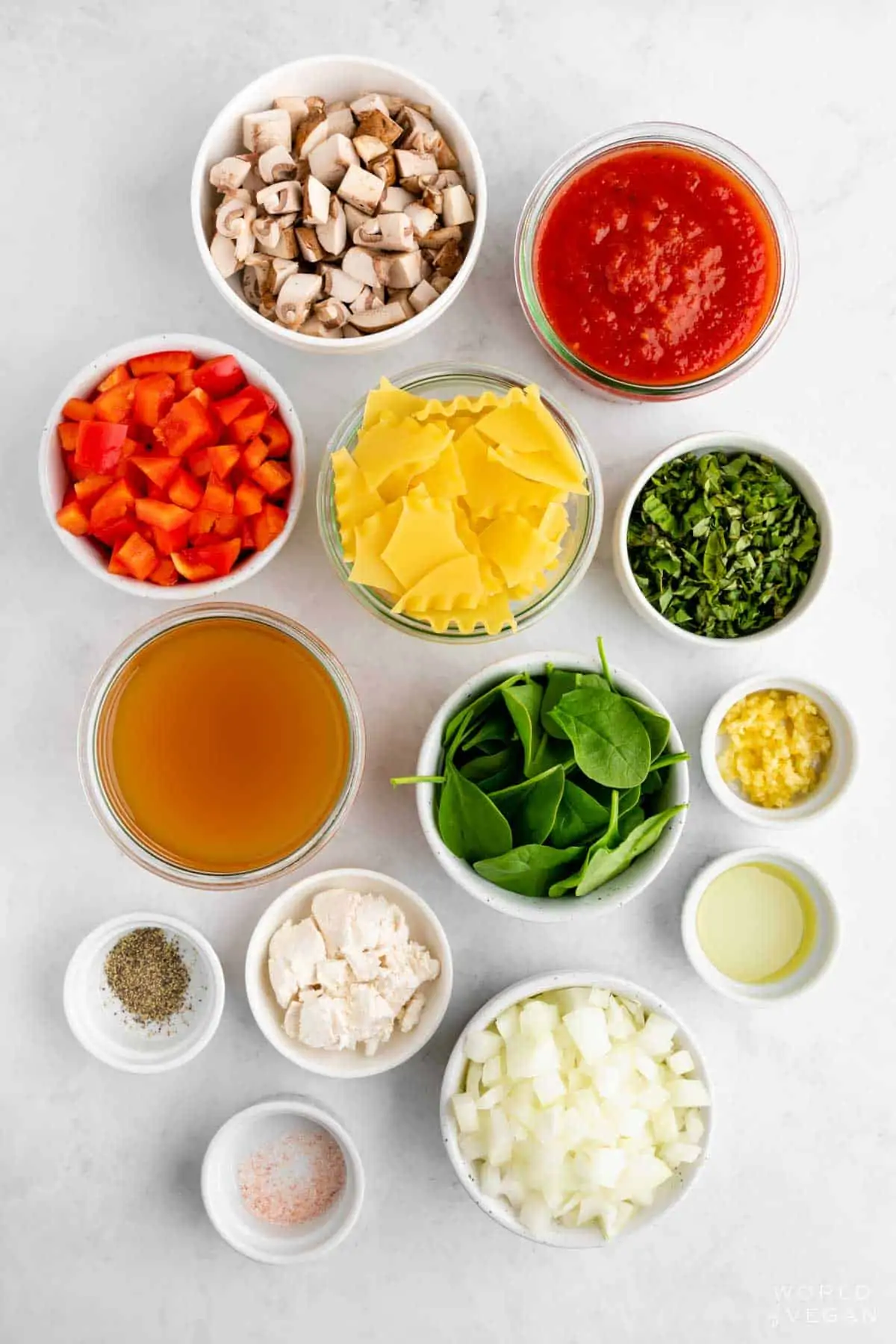 Flatlay photo of the vegan lasagna soup recipe ingredients in bowls. 