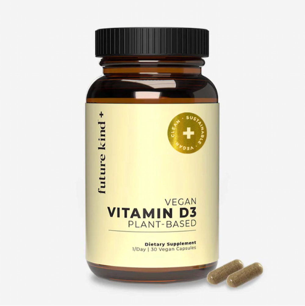 A bottle of Future Kind's vegan vitamin D with a couple of capsules beside it.