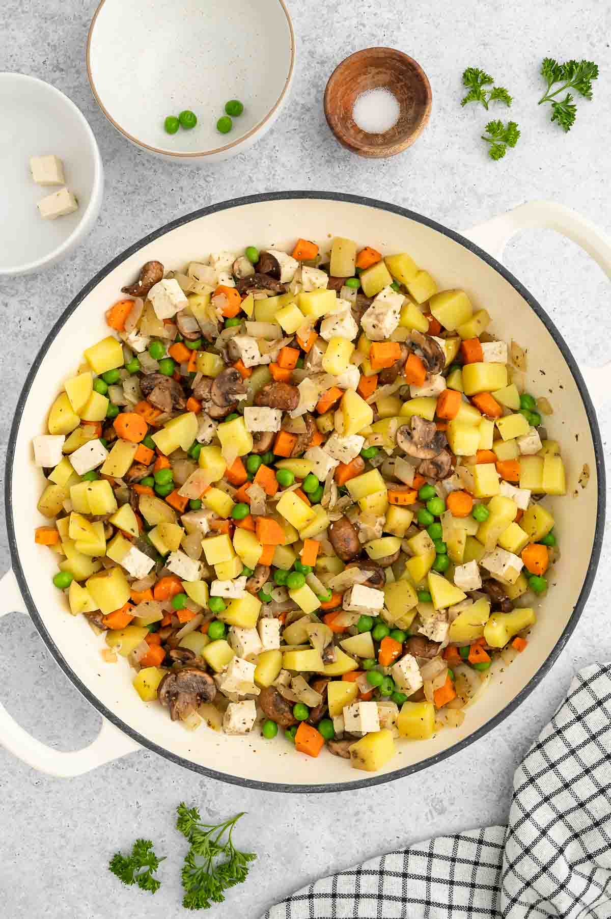 The vegan chicken pot pie vegetable filling in a Dutch oven.