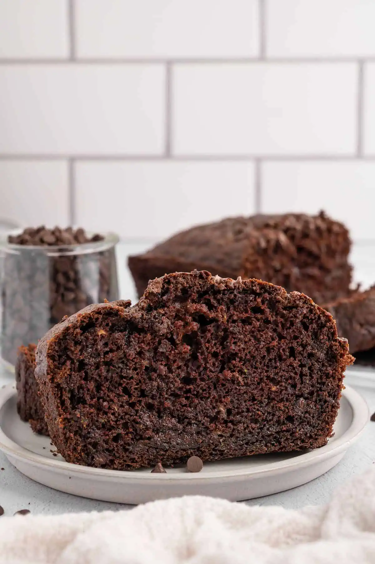 A slice of vegan chocolate zucchini bread.