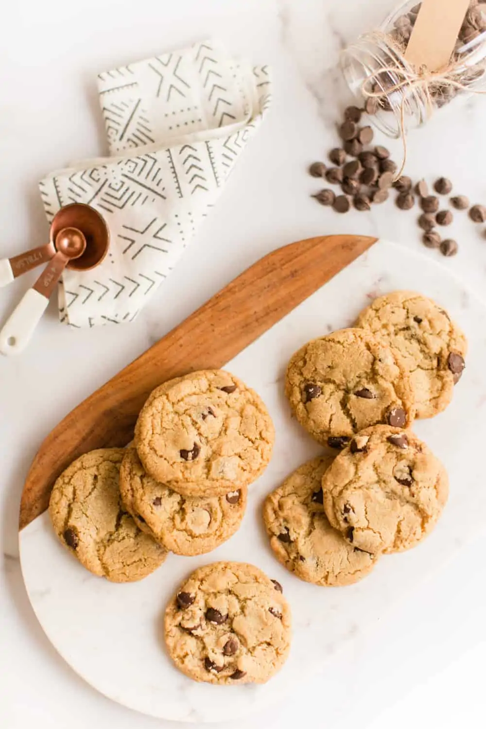 Chewy Vegan Chocolate Chip Cookies on a serving board.