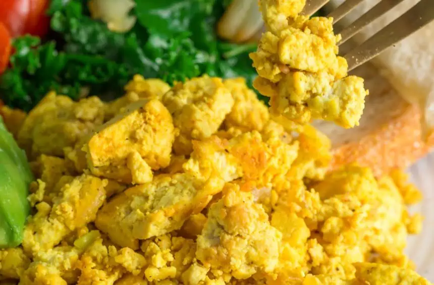 vegan tofu scramble eggs on a fork