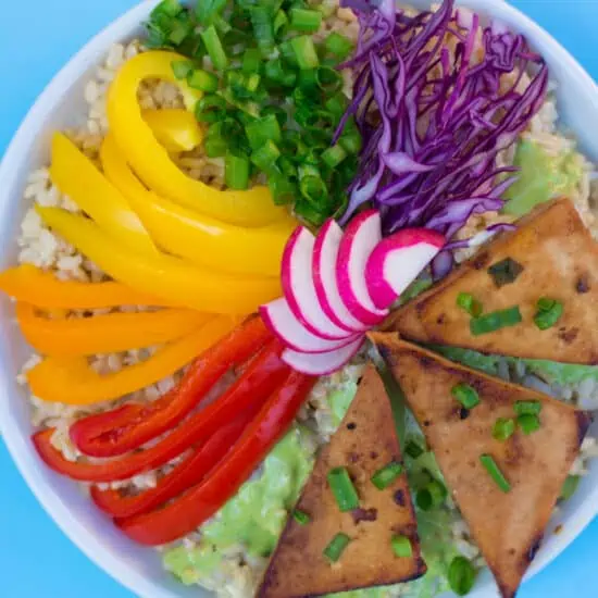 Cilantro Tahini Dressing over Rice Veggies and Grilled Tofu Triangles