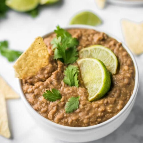 Super Easy Vegan Refried Beans Cooked in Your Slow Cooker