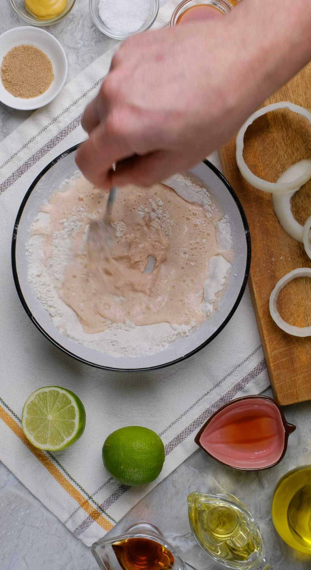 A batter for vegan onion rings being prepped.
