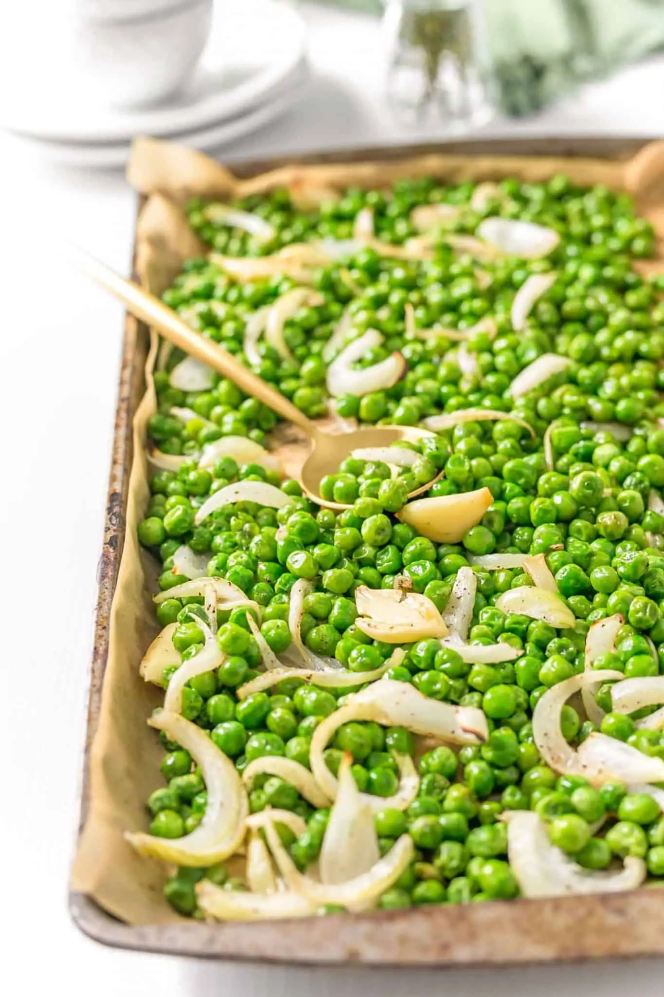 Roasted Peas And Onions on a Sheet Pan.