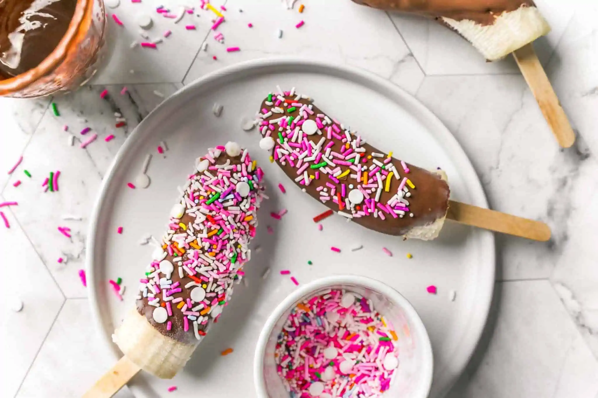 Chocolate Covered Frozen Banana Pops With Vegan Sprinkles