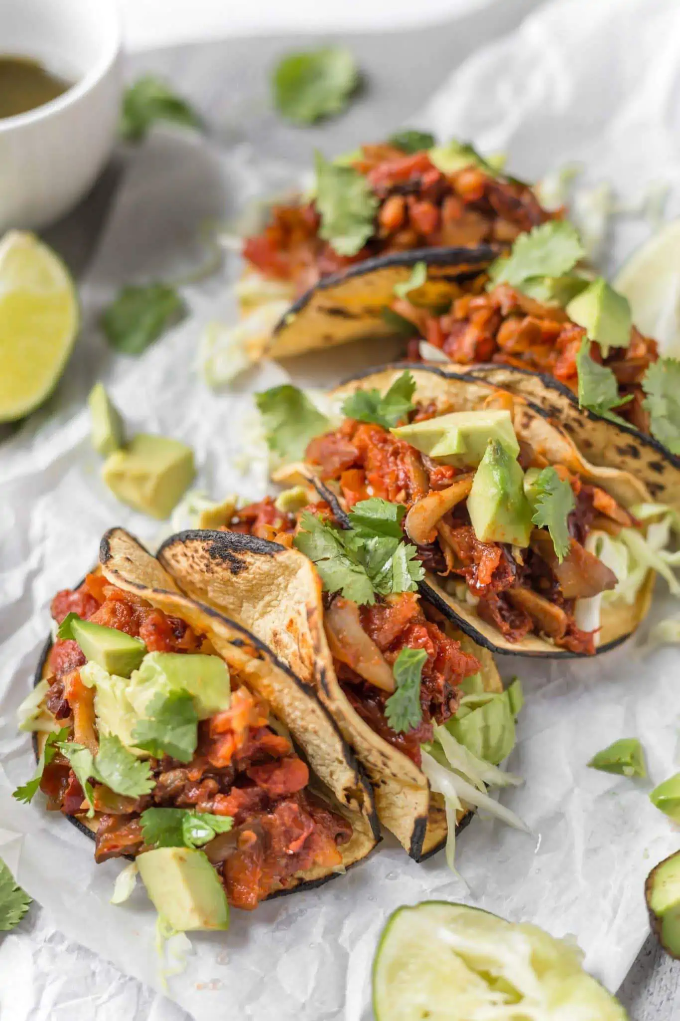 Mushrooms tacos in corn tortillas.