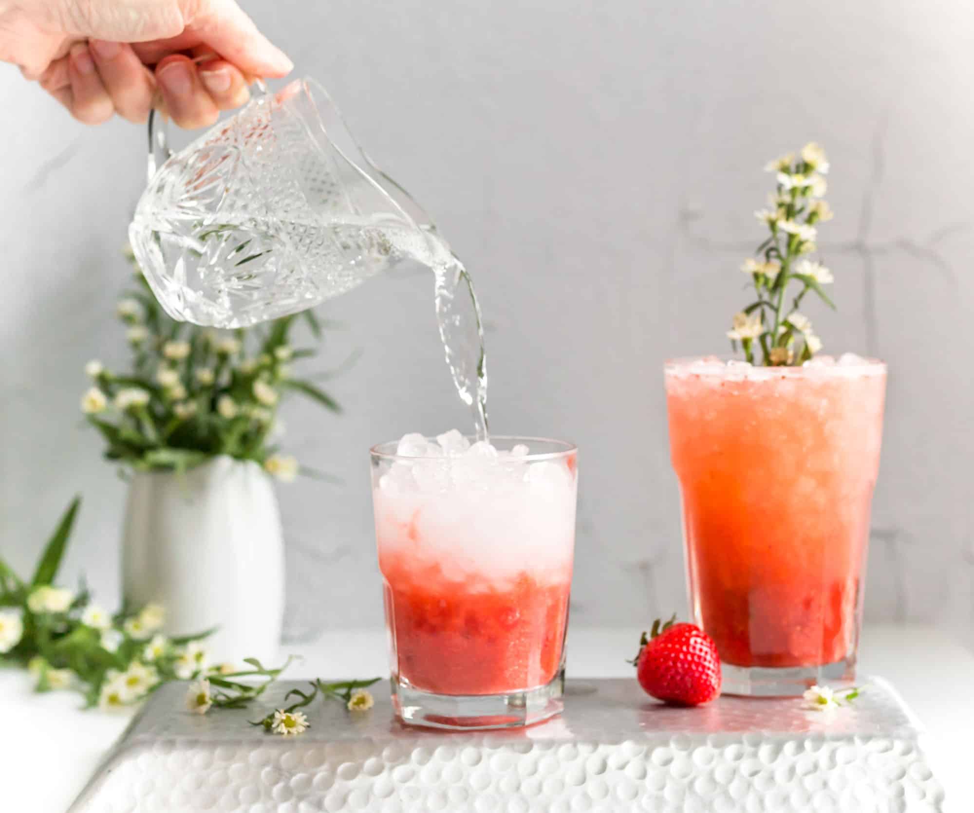Serving The Perfect Summer Drink With Strawberries and Peaches and Fizzy Water