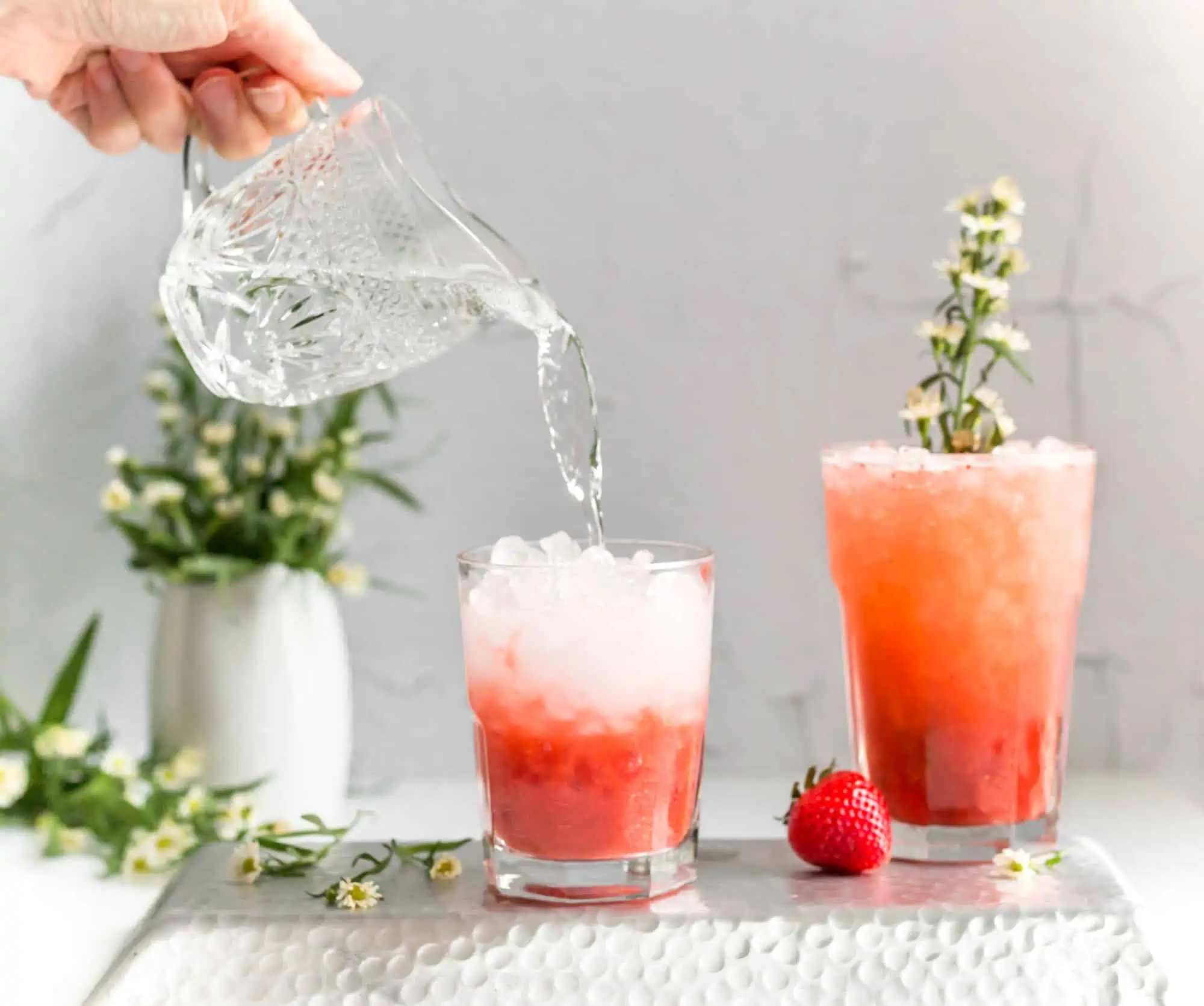 Serving The Perfect Summer Drink With Strawberries and Peaches and Fizzy Water