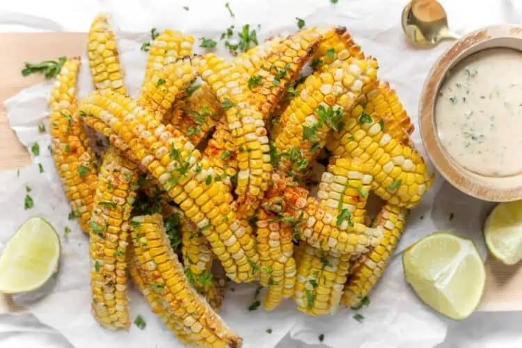 Chipotle Air Fryer Corn Ribs Recipe Stacked on a Serving Platter and Garnished