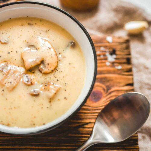 Easy Vegan Cashew Cream of Mushroom Soup in a Ceramic Bowl