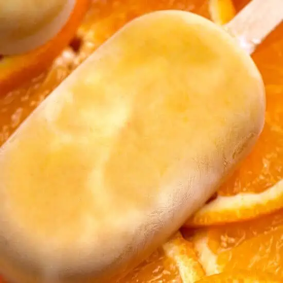 vegan creamsicle on sliced oranges