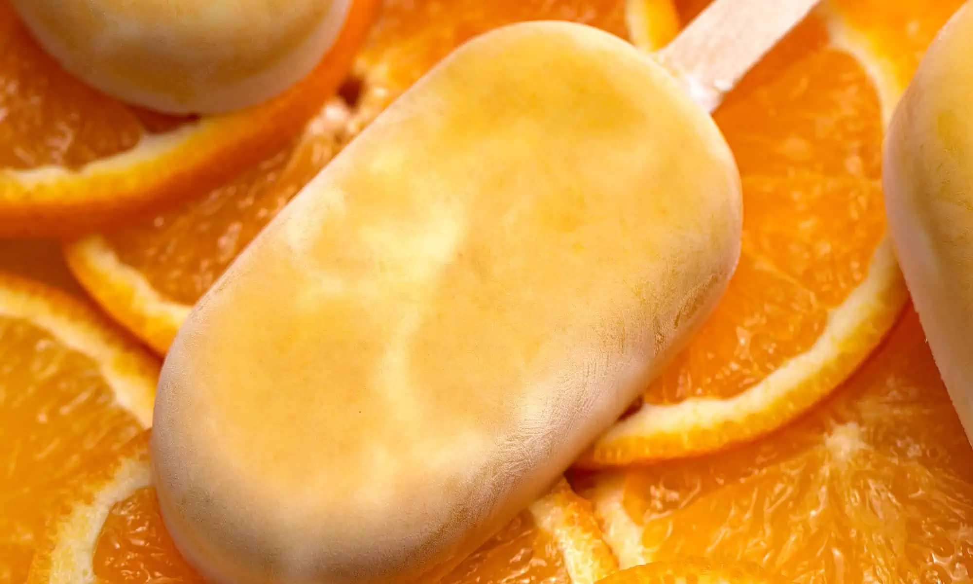 vegan creamsicle on sliced oranges