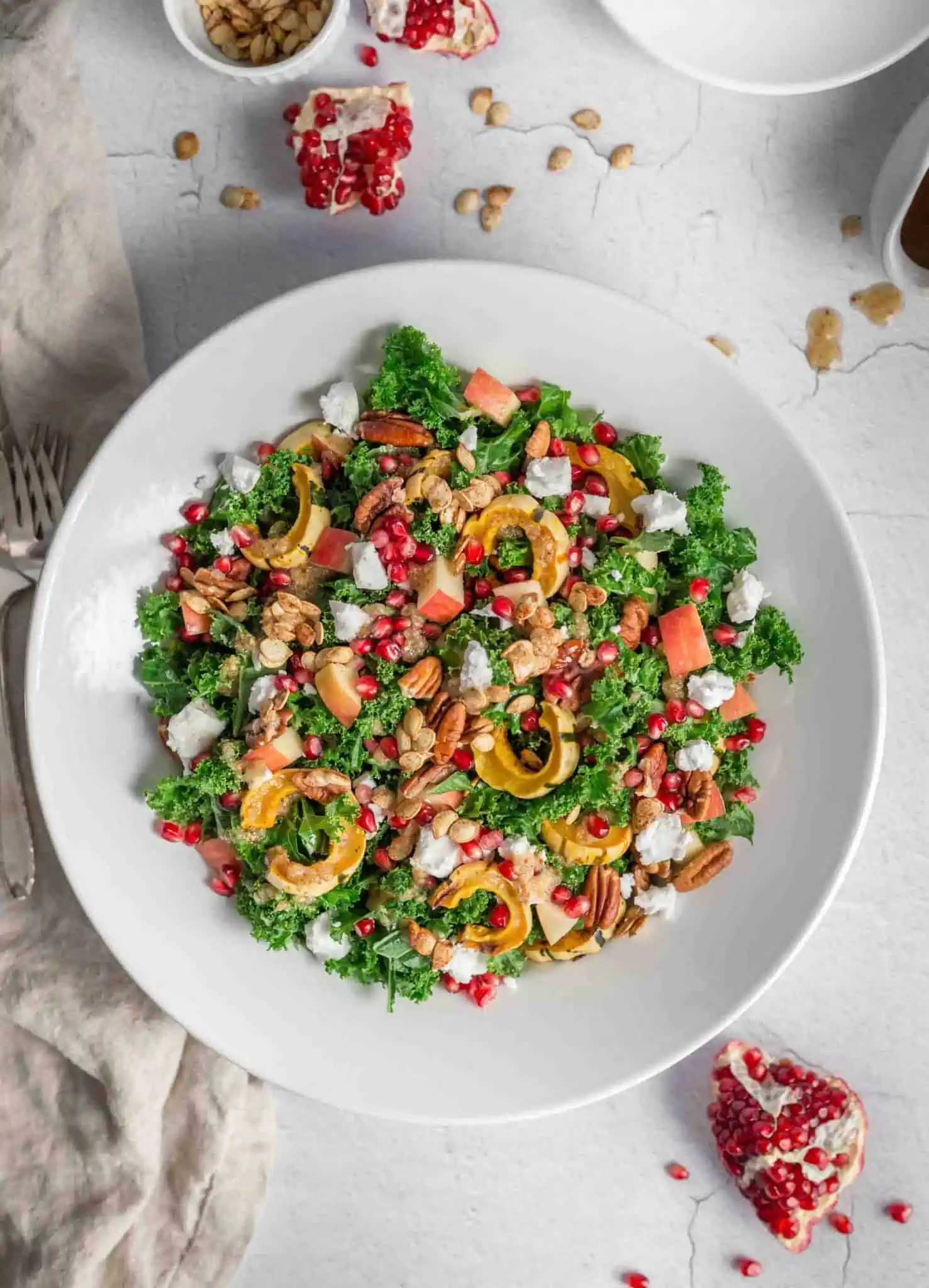 Easy Plant-Based Squash Kale Salad for Vegan Thanksgiving Flatlay on a White Plate