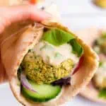 vegan baked falafel balls wrapped in pita