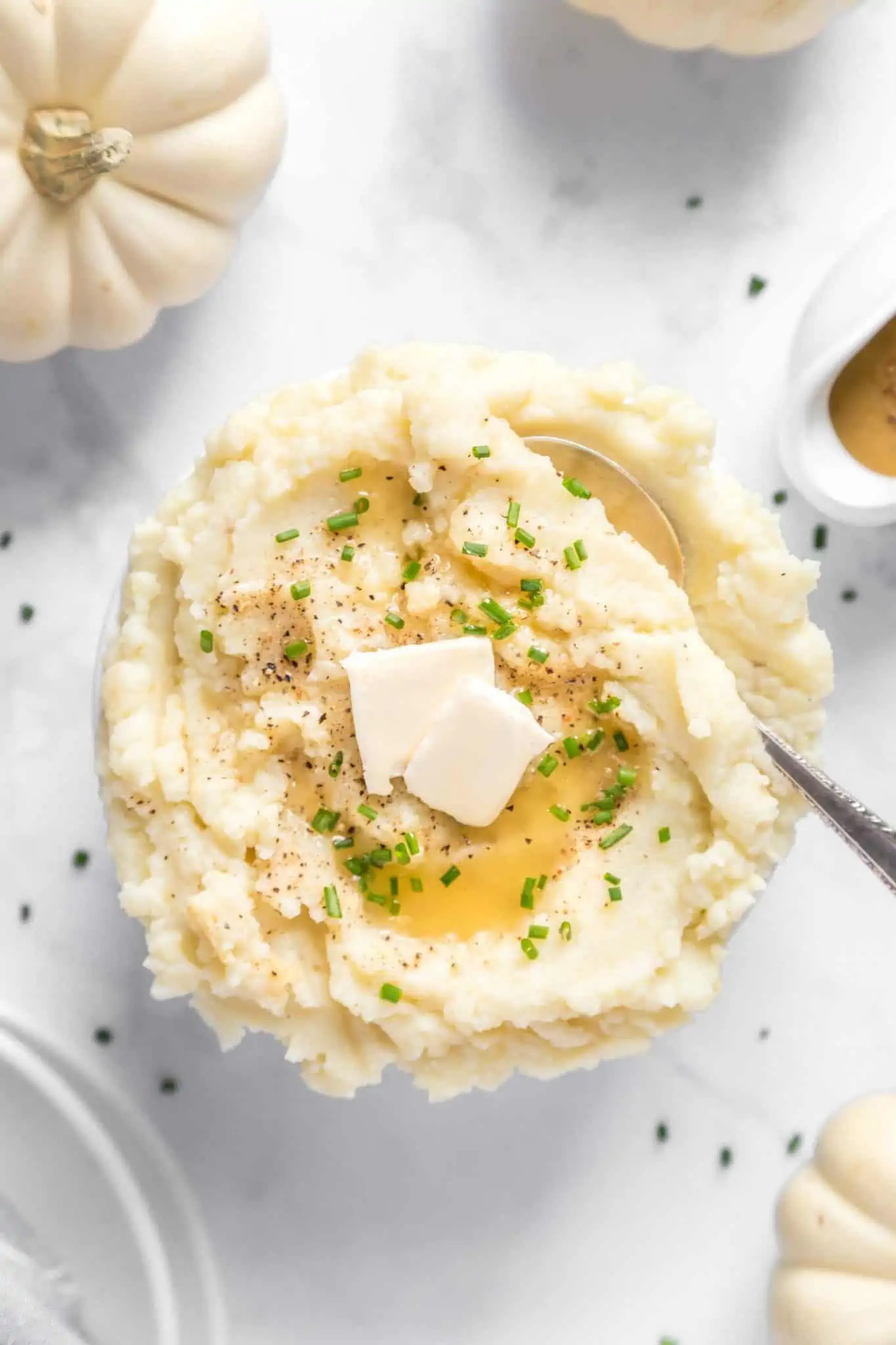 Best Dairy-Free Mashed Potato Recipe Served in a Bowl With Vegan Butter and Chives