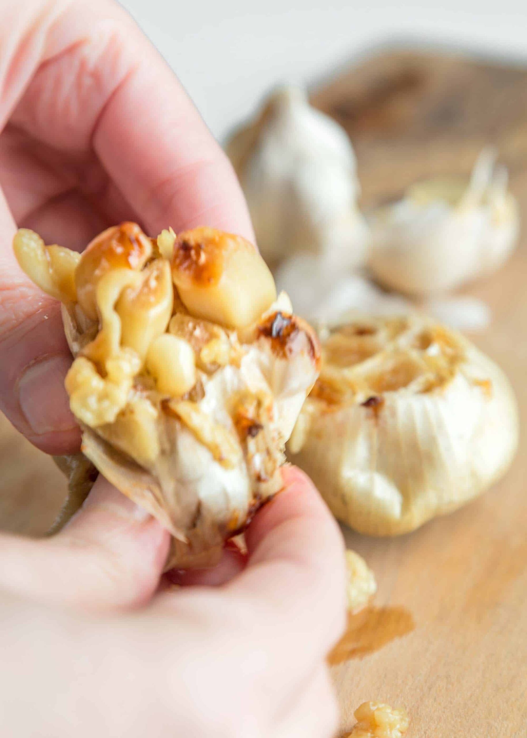 Squeezing Out Roasted Garlic With Your Hands