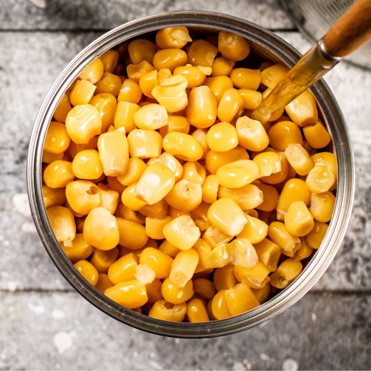 A top-down shot of canned corn.