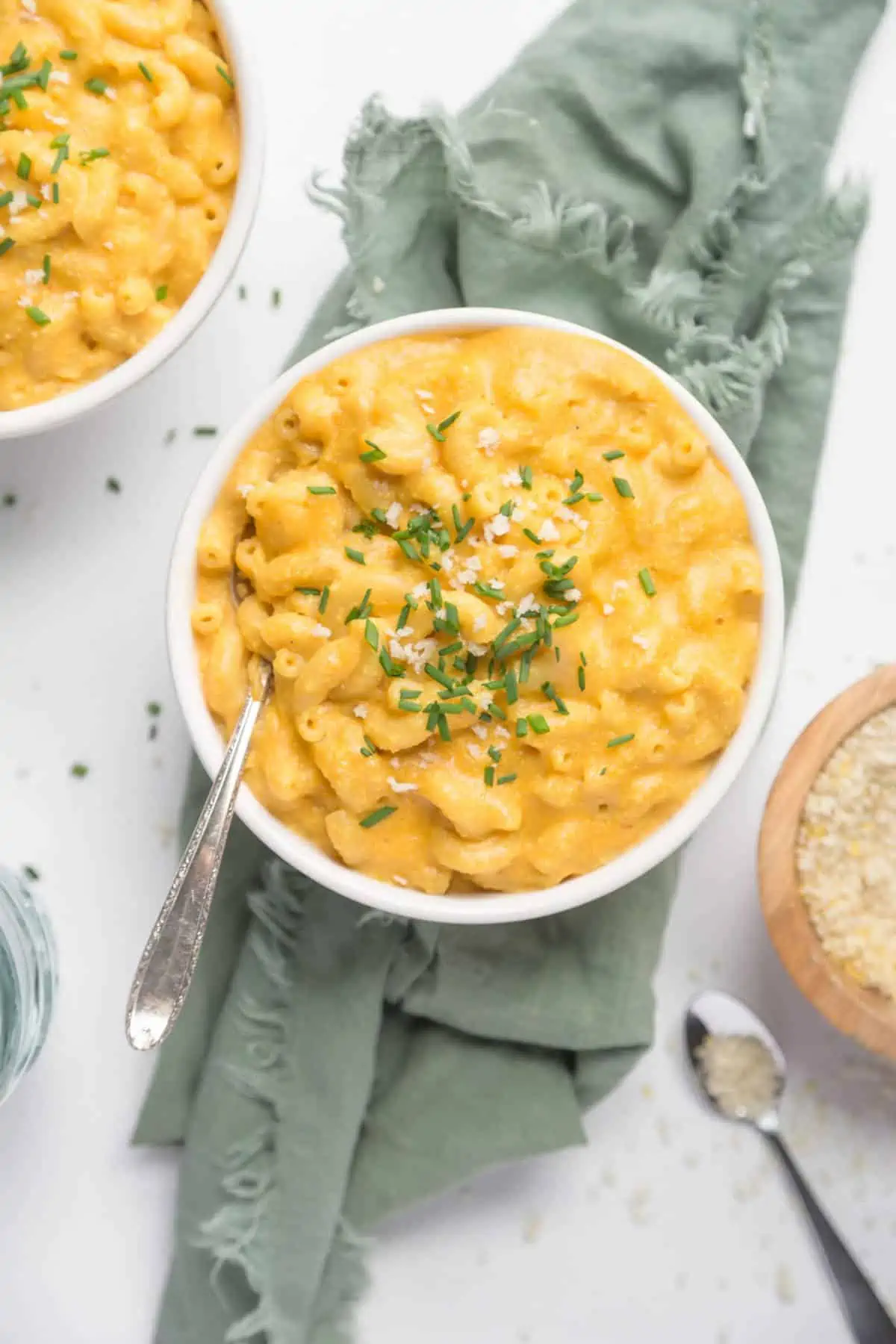 A top-down shot of vegan mac and cheese in a white bowl.