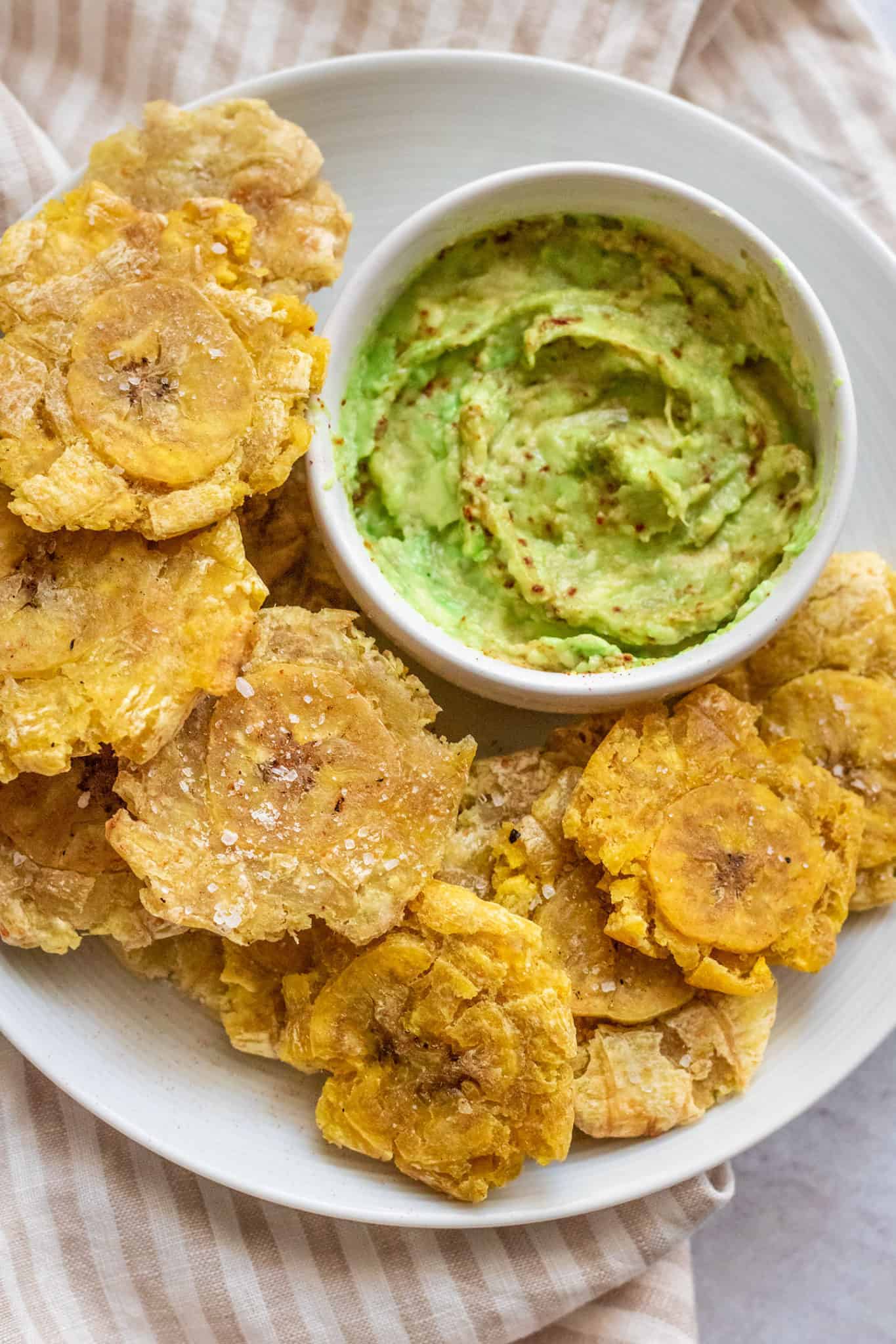 air fried tostones with guacamole on a plate