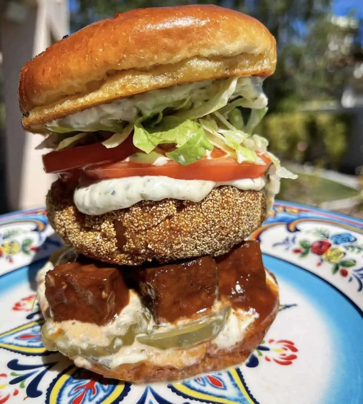 epic vegan fried chicken sandwich stacked with bbq tofu and more from souley vegan oakland