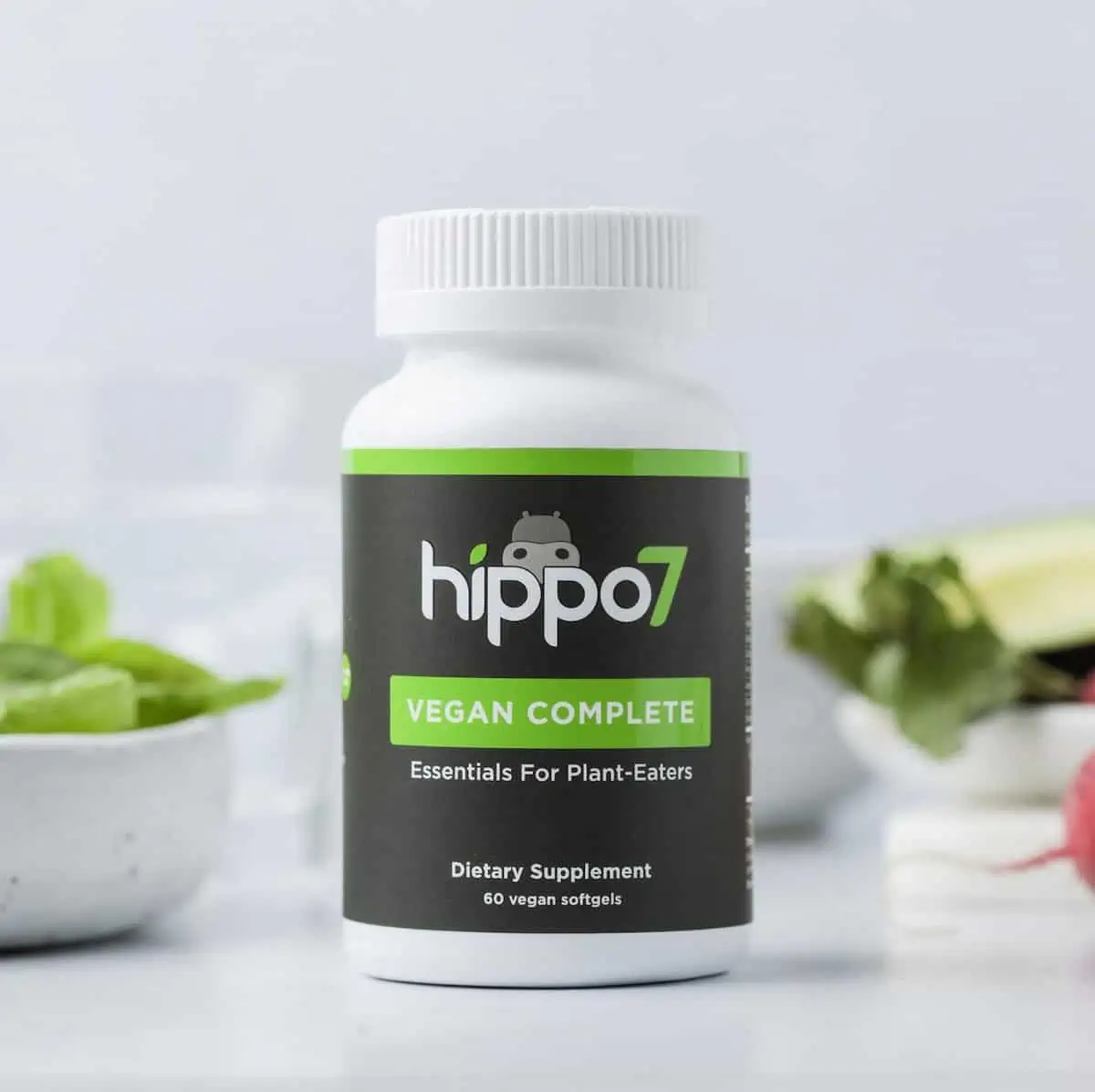 A bottle of Hippo7 brand vegan complete multivitamins.
