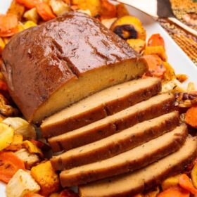 Homemade Seitan Turkey Roast on Thanksgiving Dinner Platter