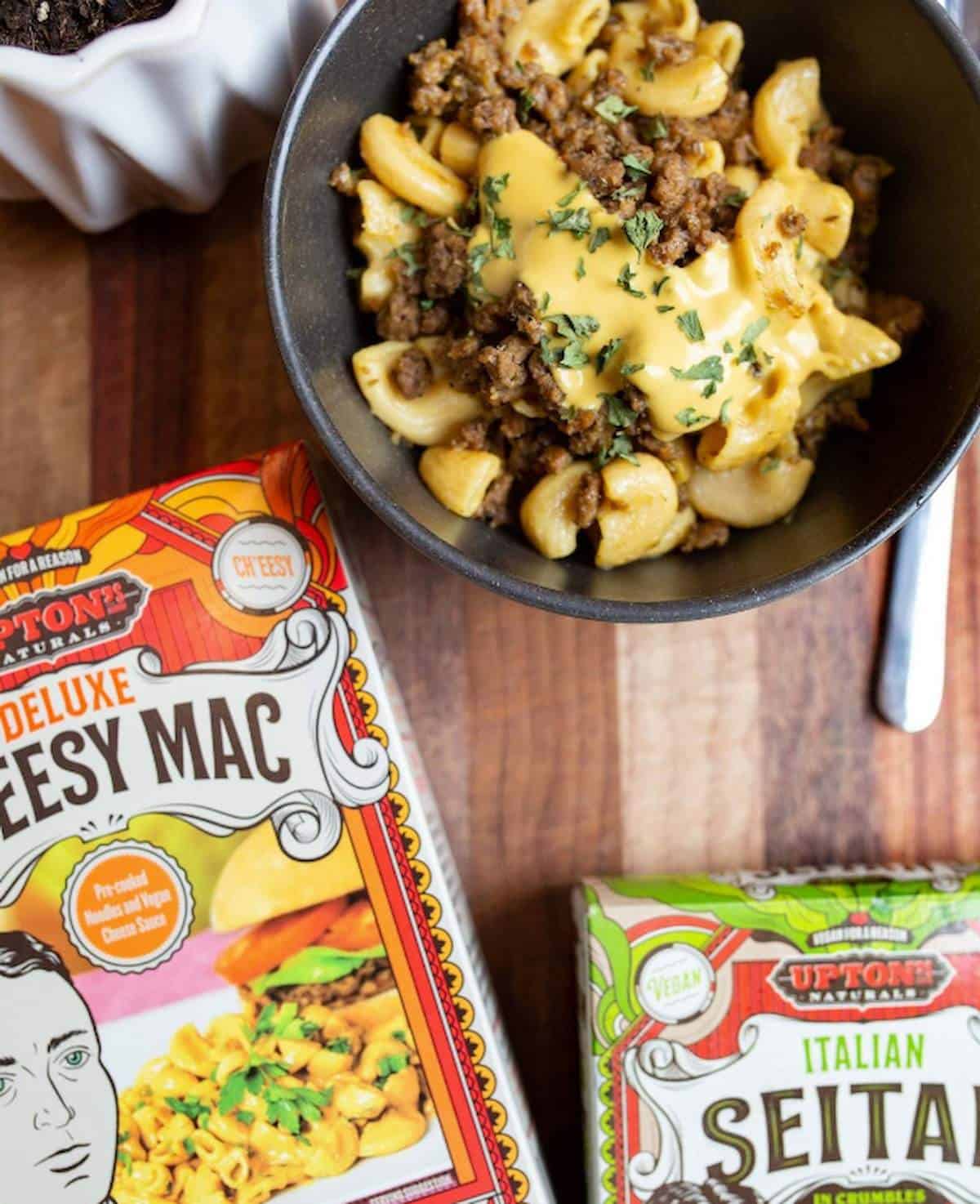 A bowl of Upton's Naturals deluxe cheesy mac topped with their Italian seitan crumbles.