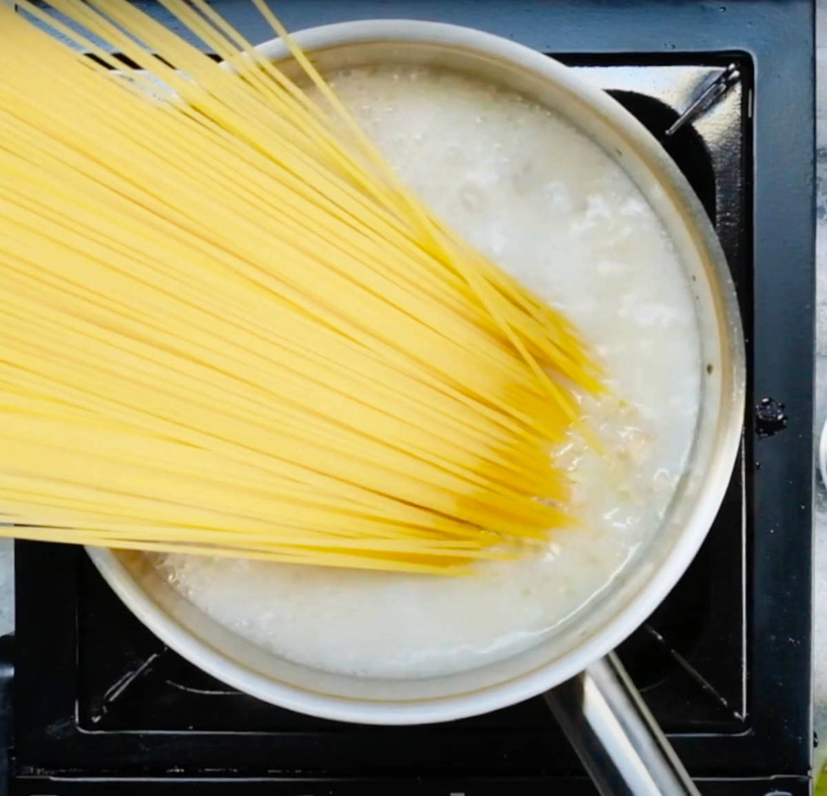 Pasta added to the boiling one pot pasta.