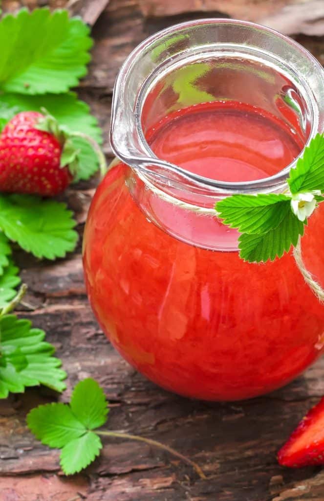 Easy Strawberry Juice Recipe Served in a Glass Pitcher