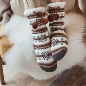 MukLuks vegan cozy faux fur knit cabin socks.