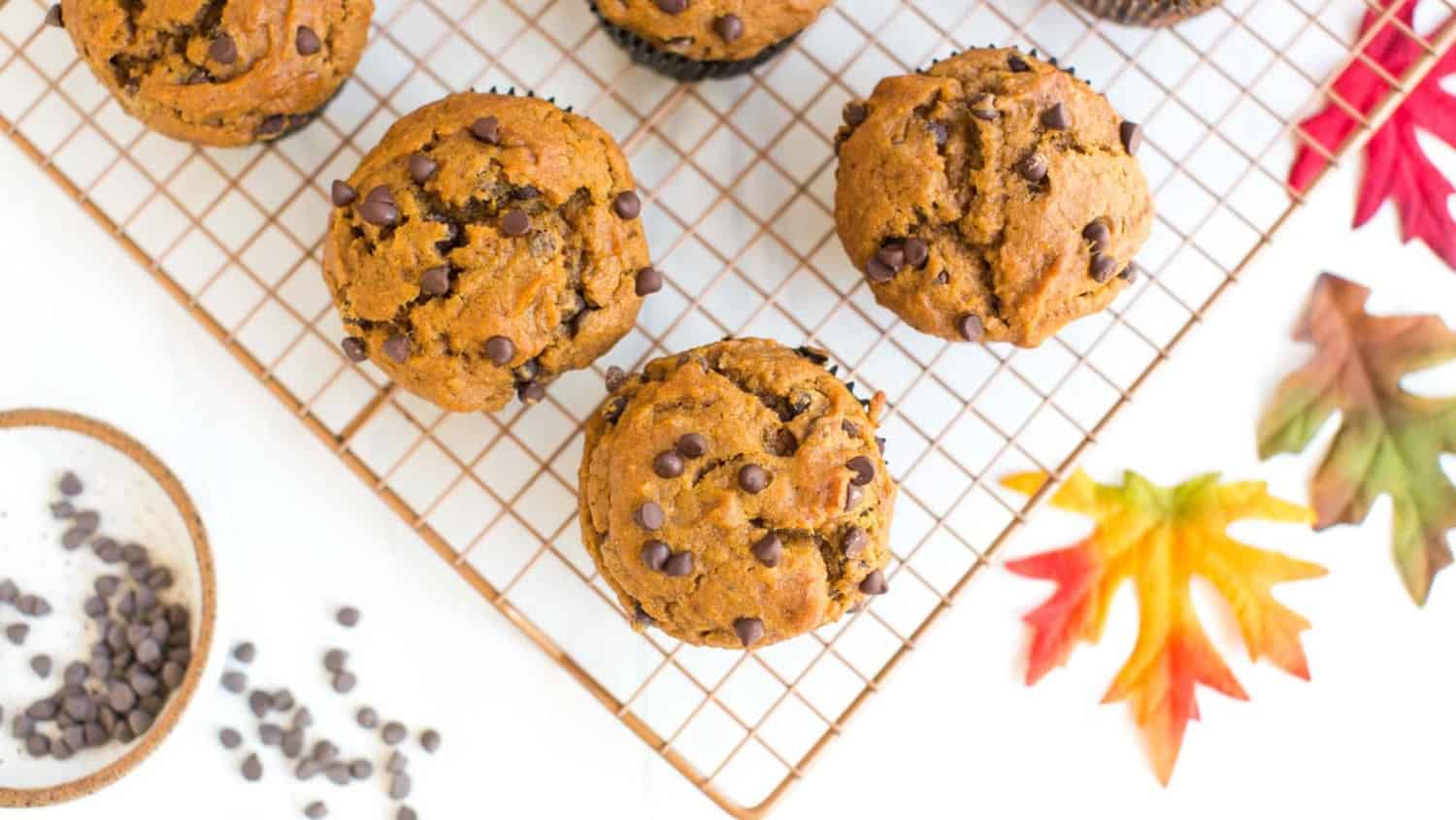 vegan pumpkin chocolate chip muffins on a mat