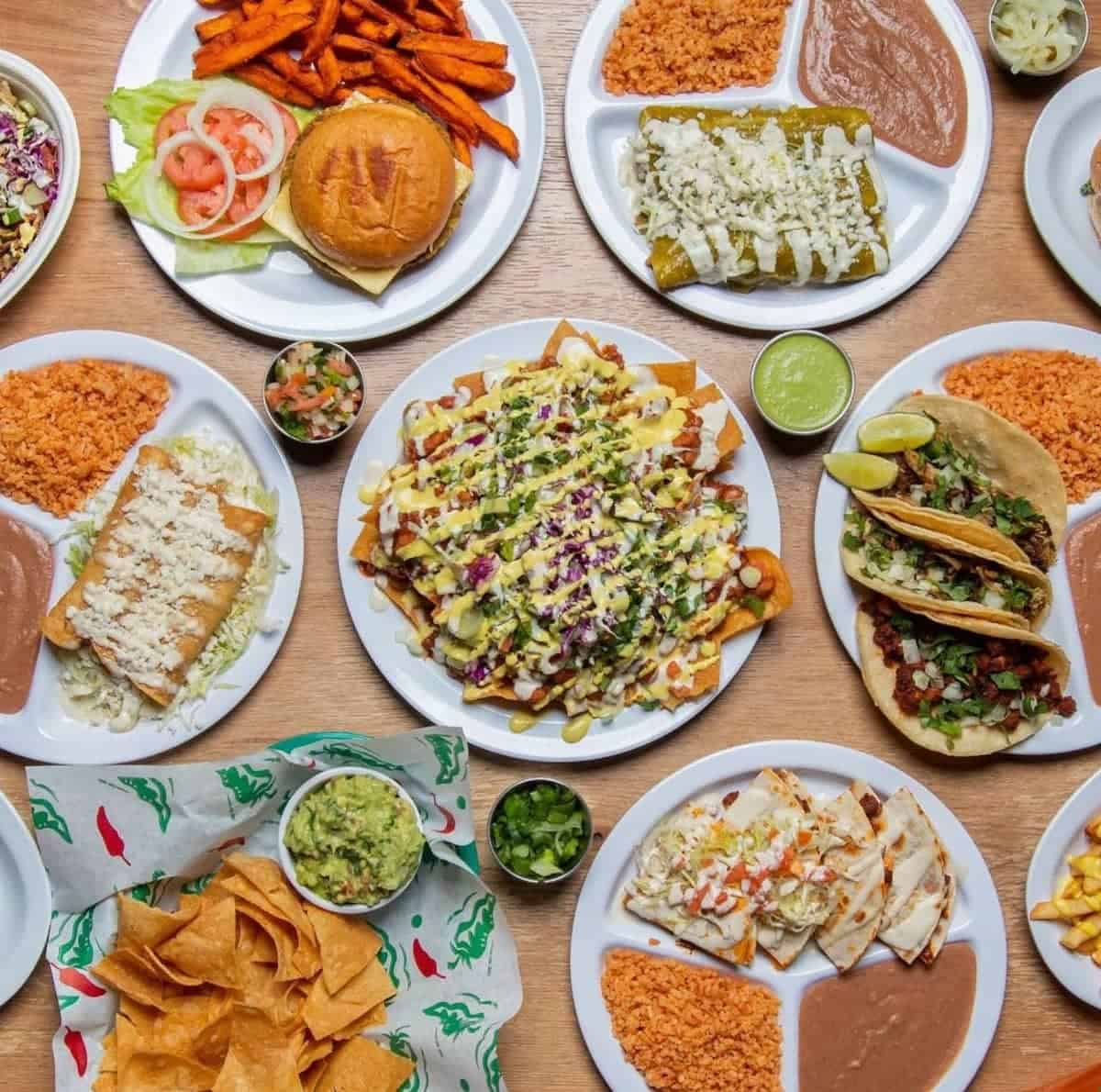 A colorful spread of vegan food on a table.