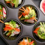 Vegan sushi cupcakes in a muffin tin.