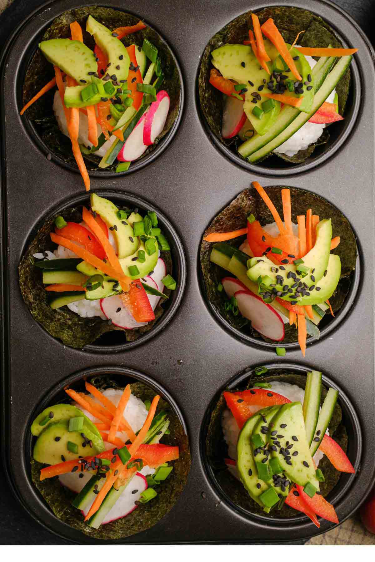 Vegan sushi cupcakes iin a muffin tin.