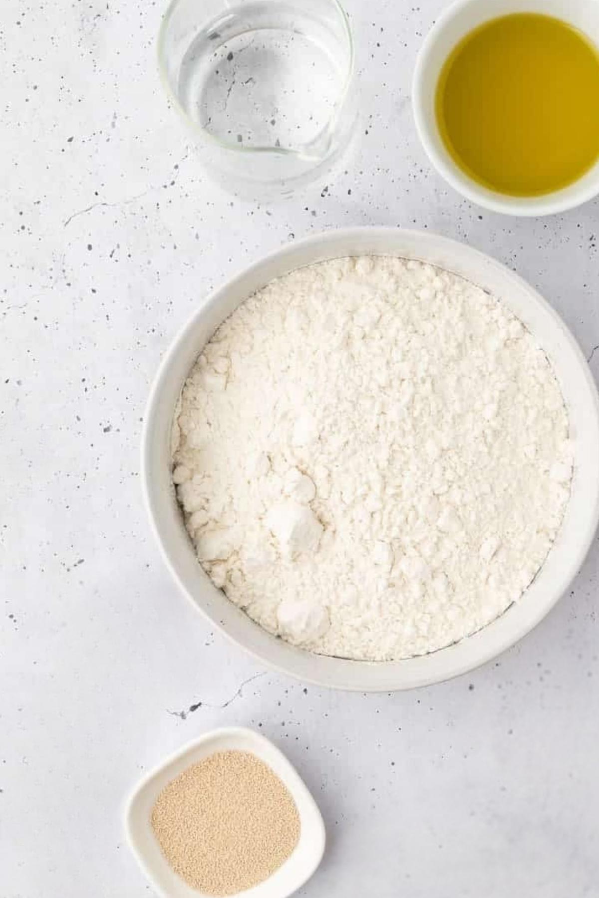 Ingredients for making vegan pita bread at home.