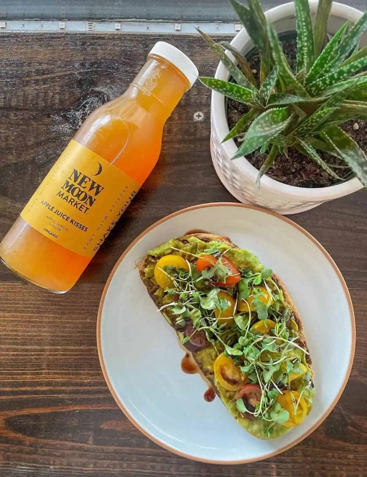 Avocado toast and cold-pressed juice from New Moon Market in Orlando.