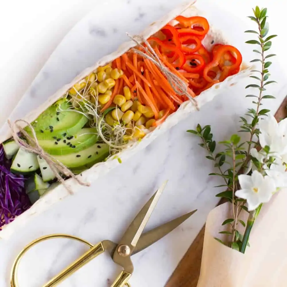 A Lavash wrap filled with colorful vegetables.