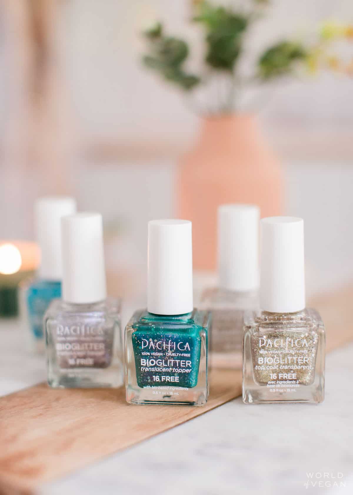 Array of Pacifica eco friendly sparkly holiday nail polishes. 