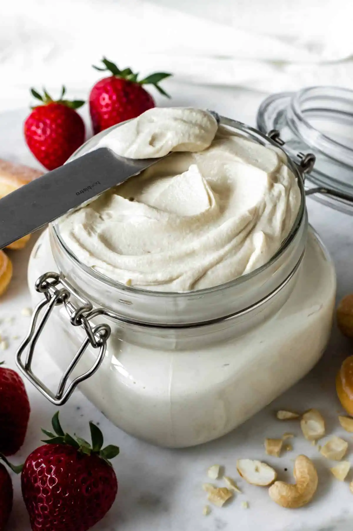 A jar of vegan mascarpone cheese.