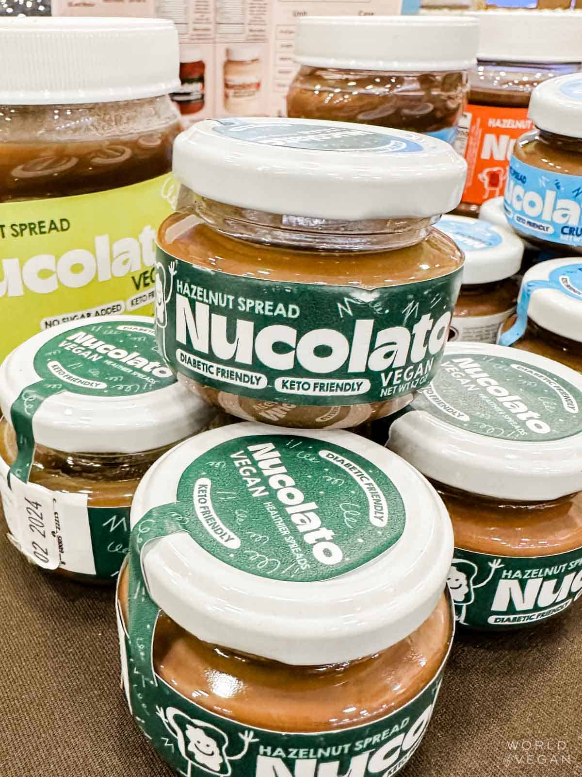 Jars of Nucolato vegan hazelnut spread.