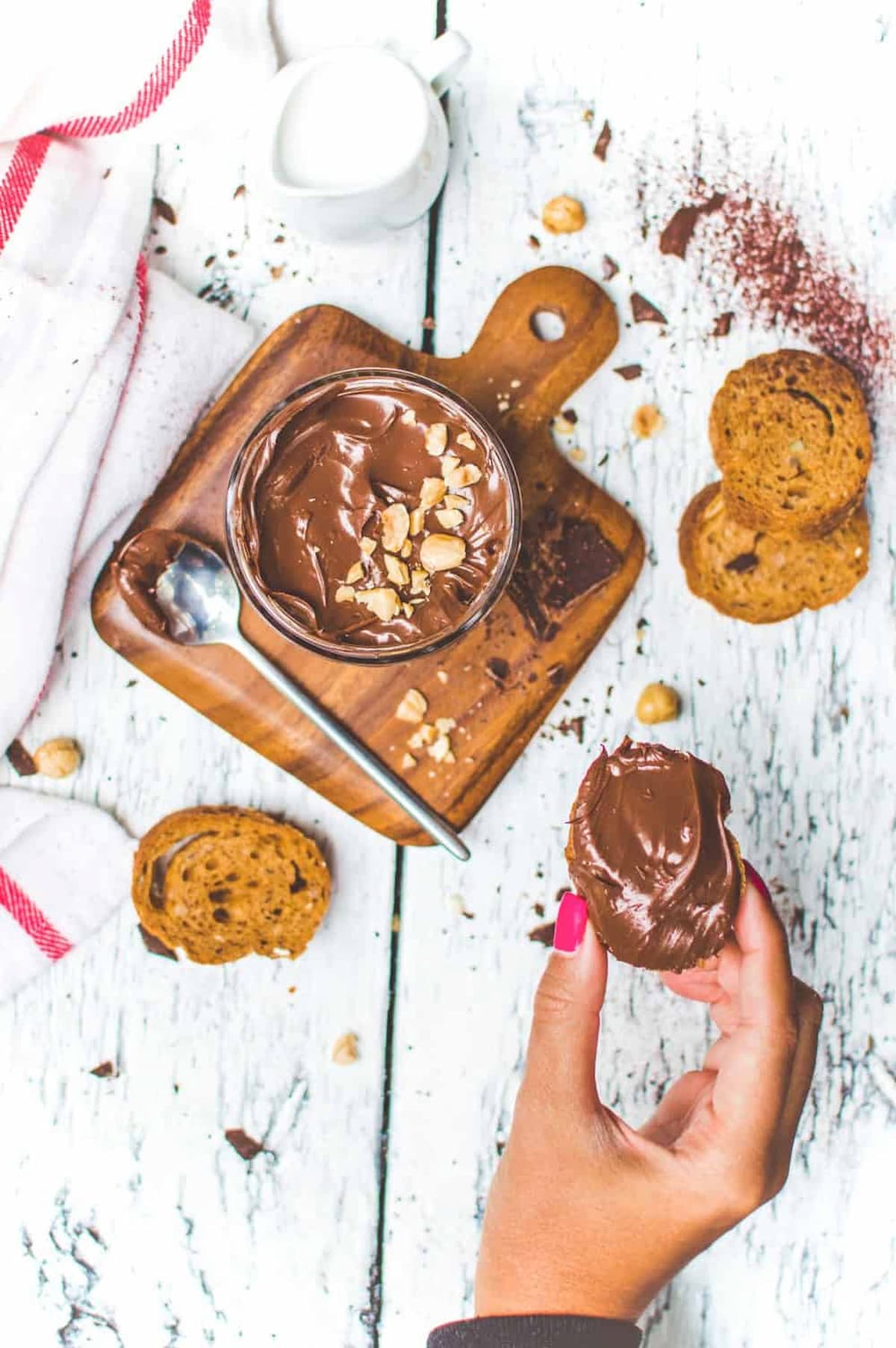 Vegan Nutella spread onto toast.